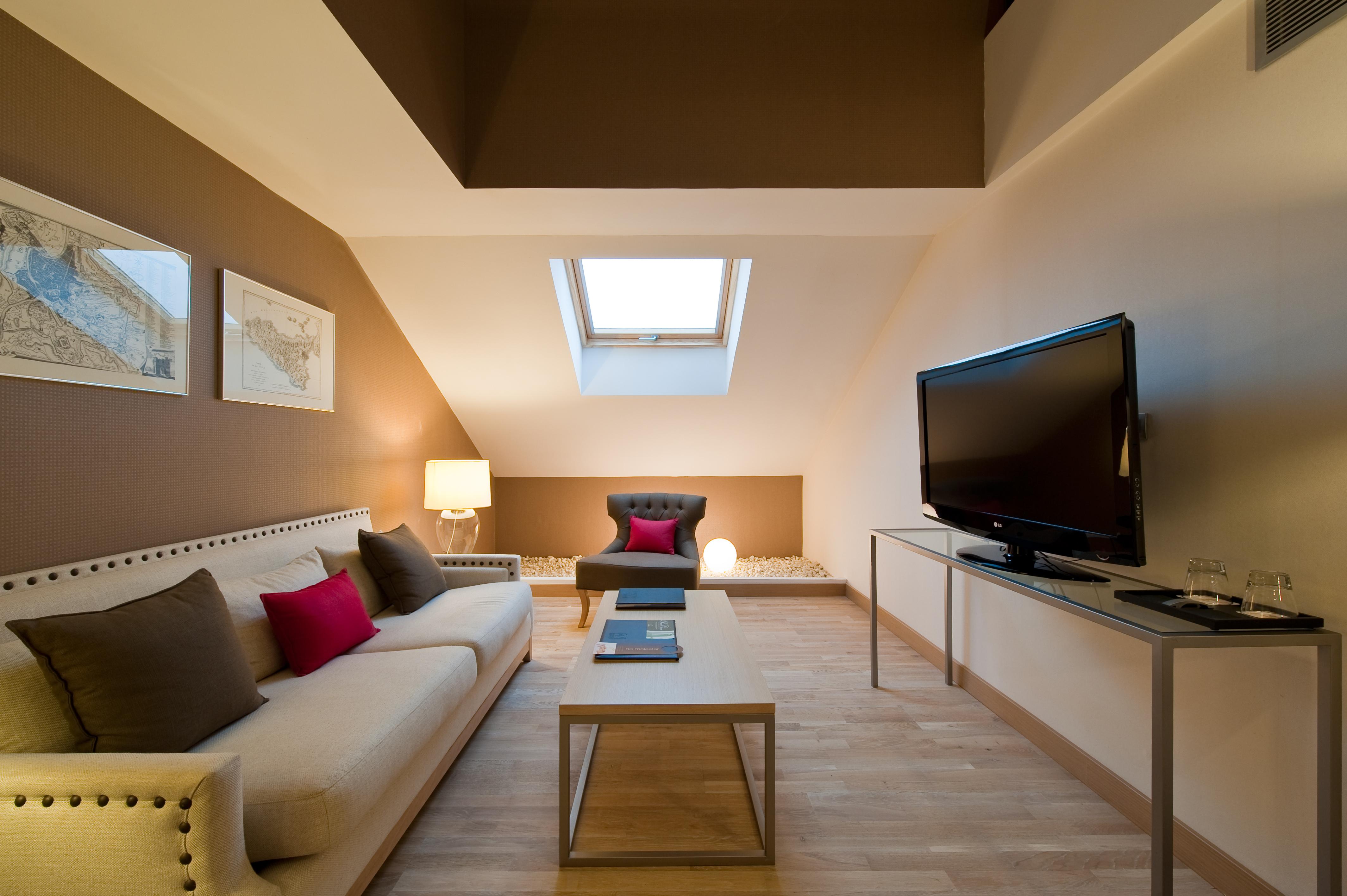 Vincci Seleccion Posada Del Patio Malaga Bilik gambar A living room in a hotel